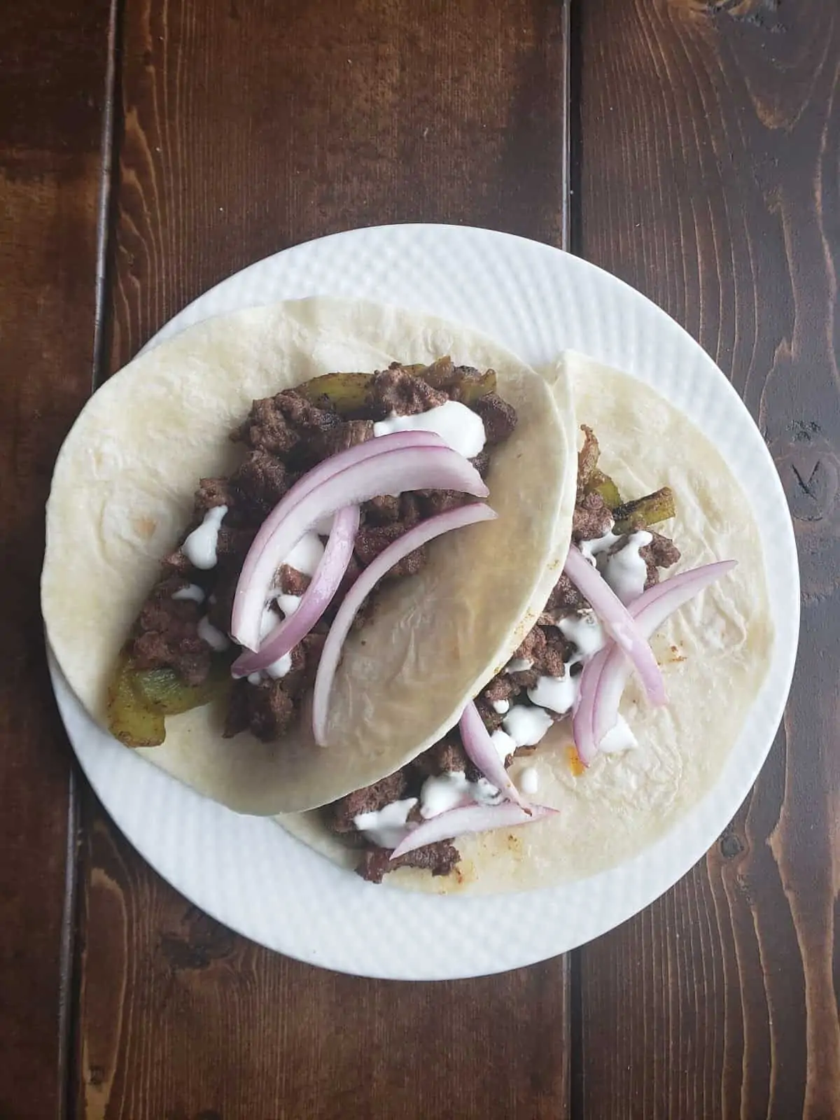 Carne Asada Fajitas with Pickled Onions and Lime Crema