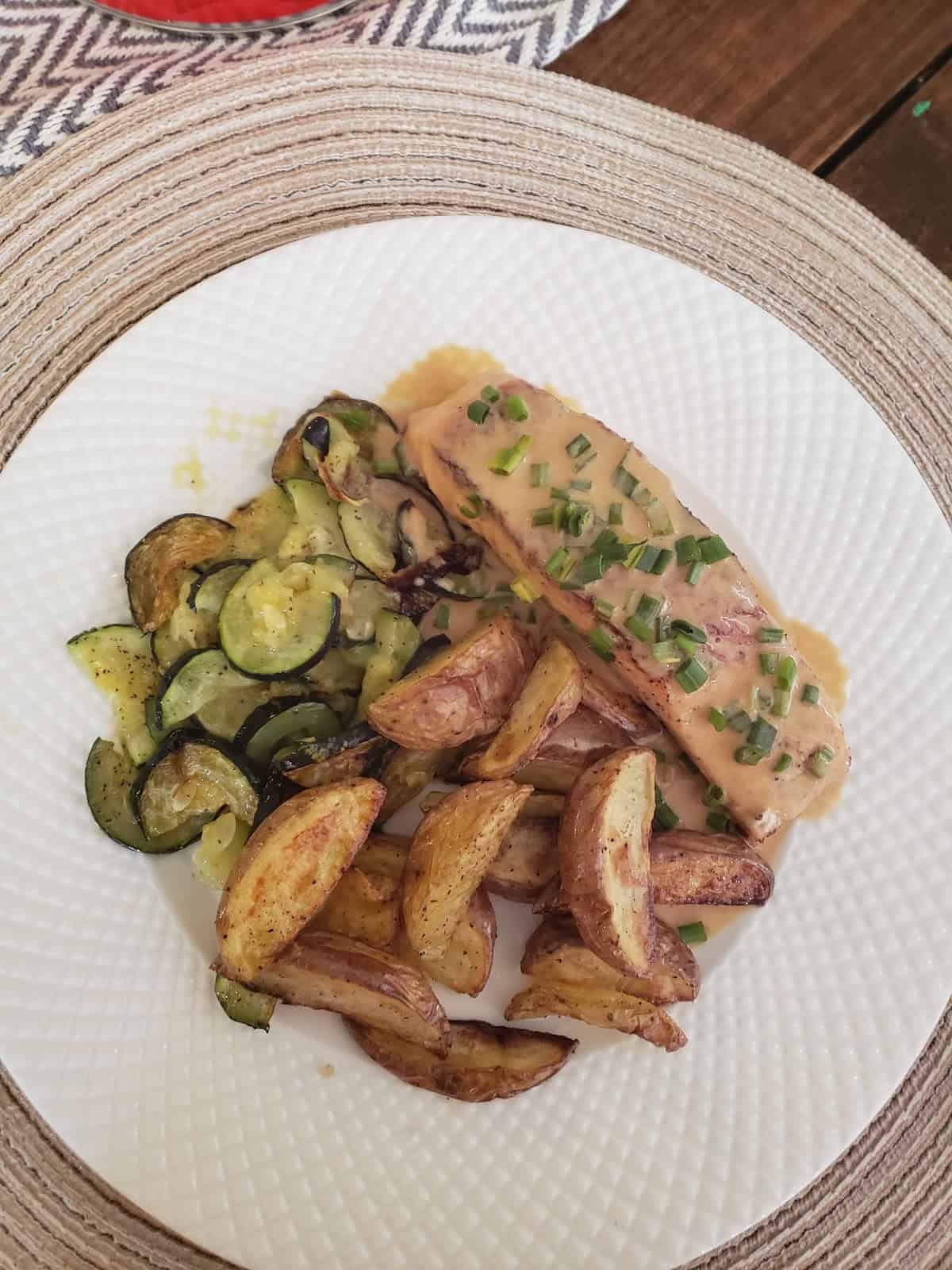 Salmon in Creamy Lemon Chive Sauce with Roasted Potato Wedges & Lemony Zucchini