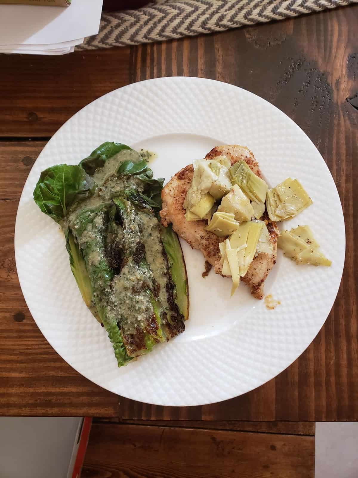 Harissa-Rubbed Chicken with Artichoke Tapenade and Seared Romaine