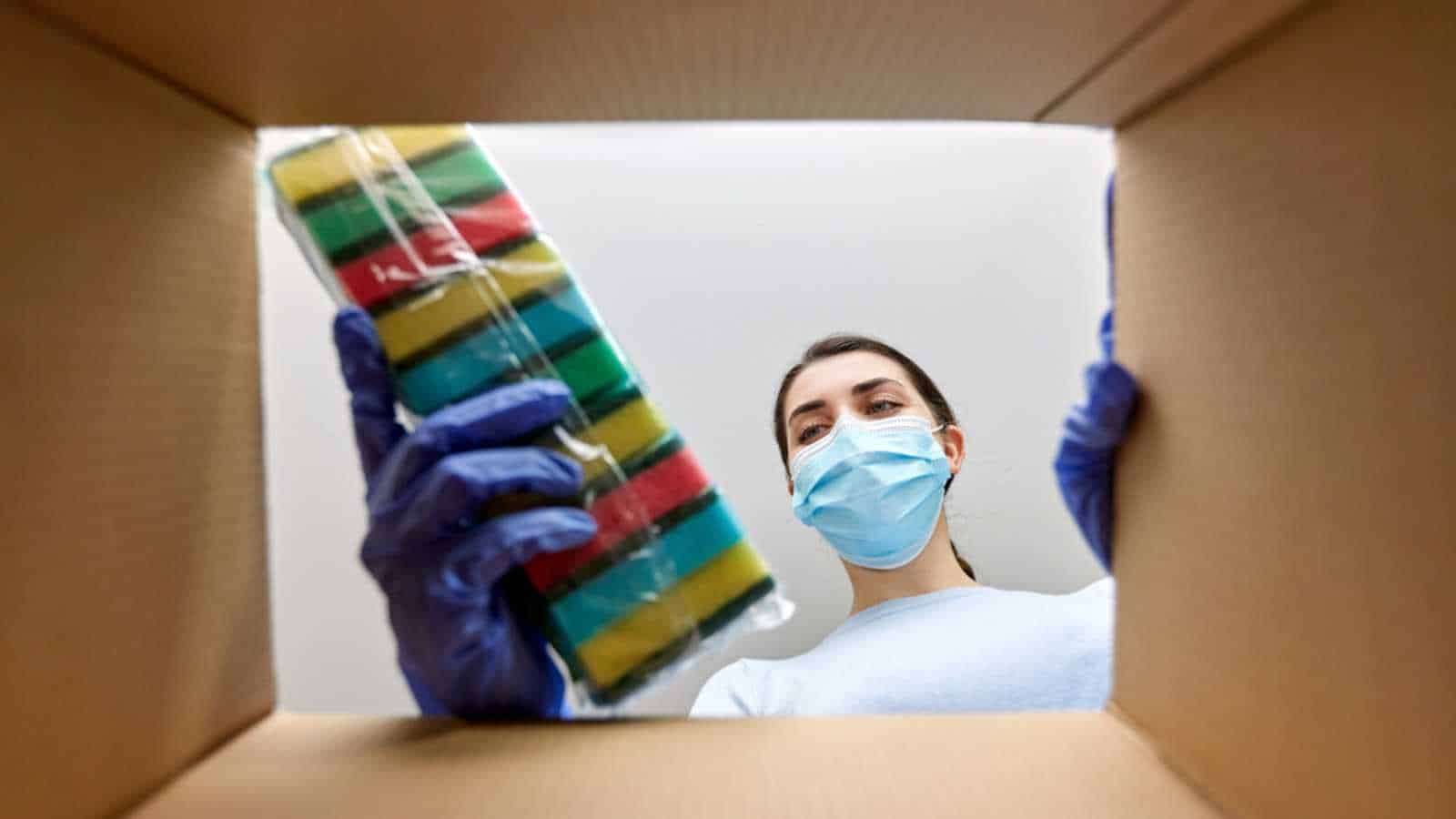Woman buying cleaning supplies