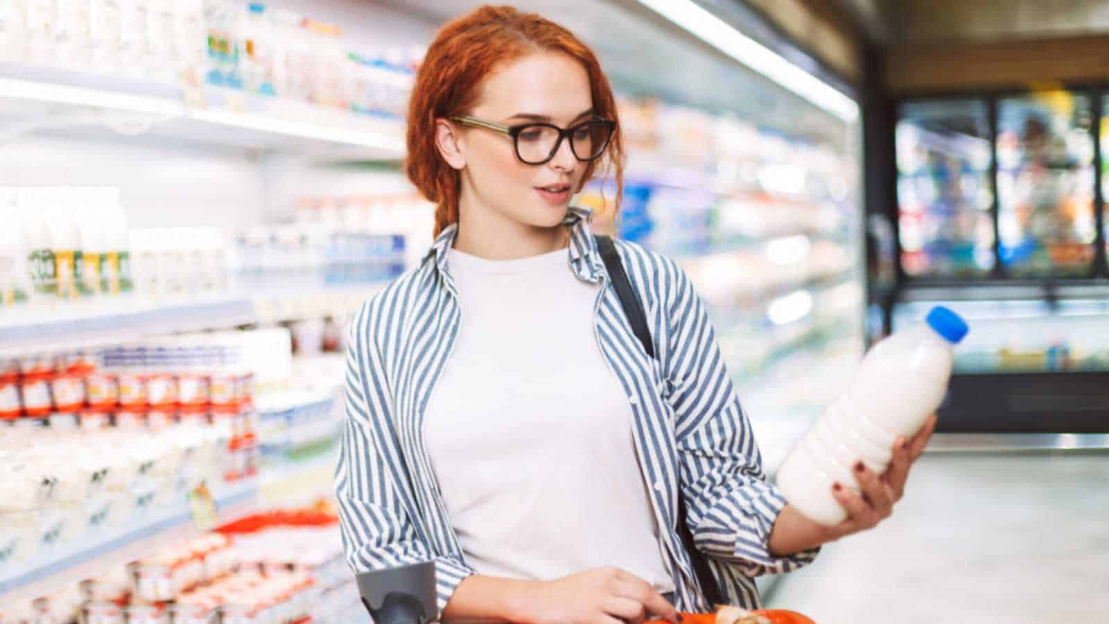 Woman buying milk