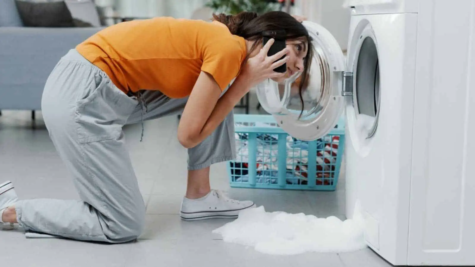 Woman checking washing machine