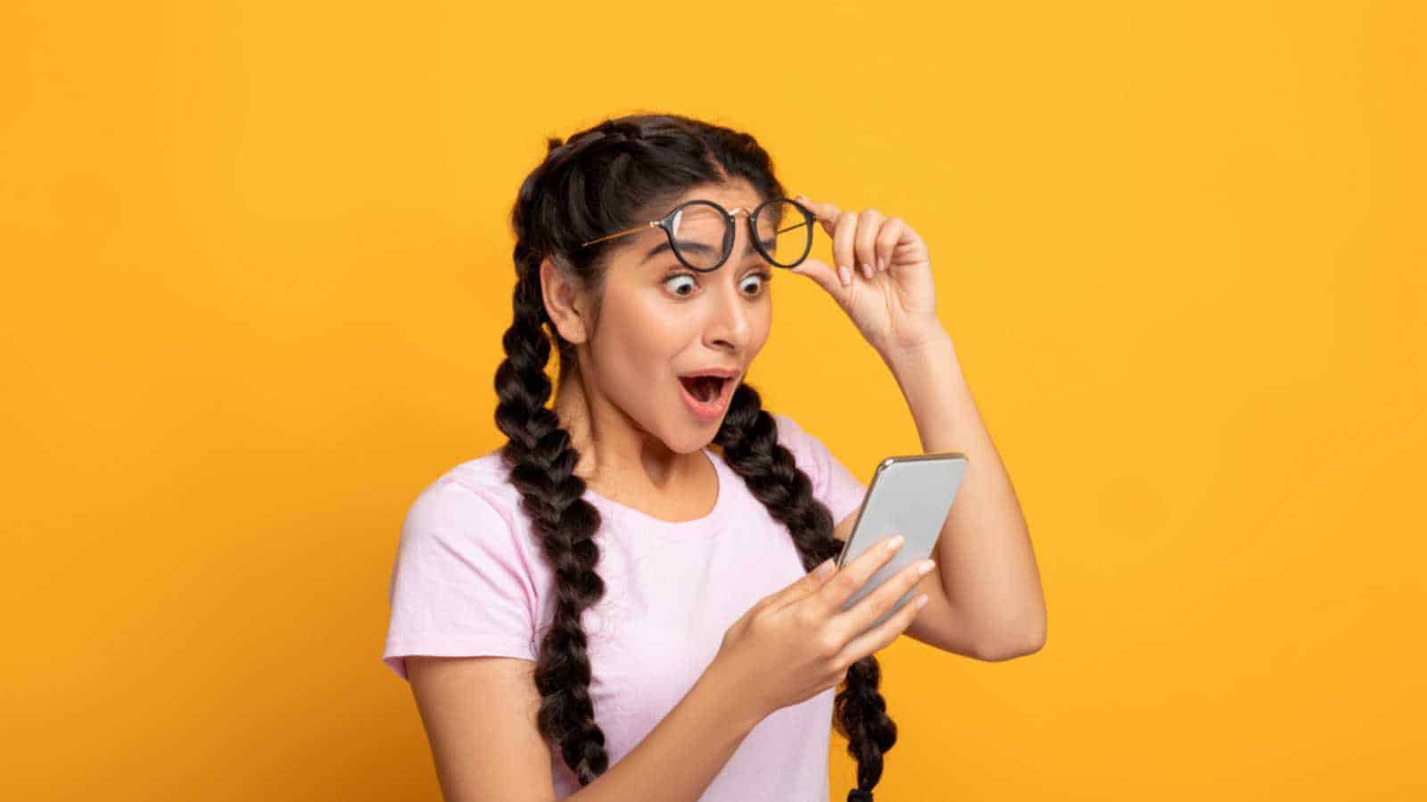 Woman excited with mobile