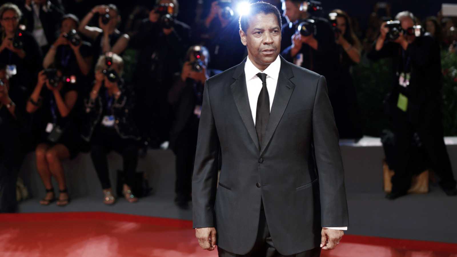 VENICE, ITALY - SEPTEMBER 10: Denzel Washington attends the premiere of 'The Magnificent Seven' during the 73rd Venice Film Festival on September 10, 2016 in Venice, Italy.