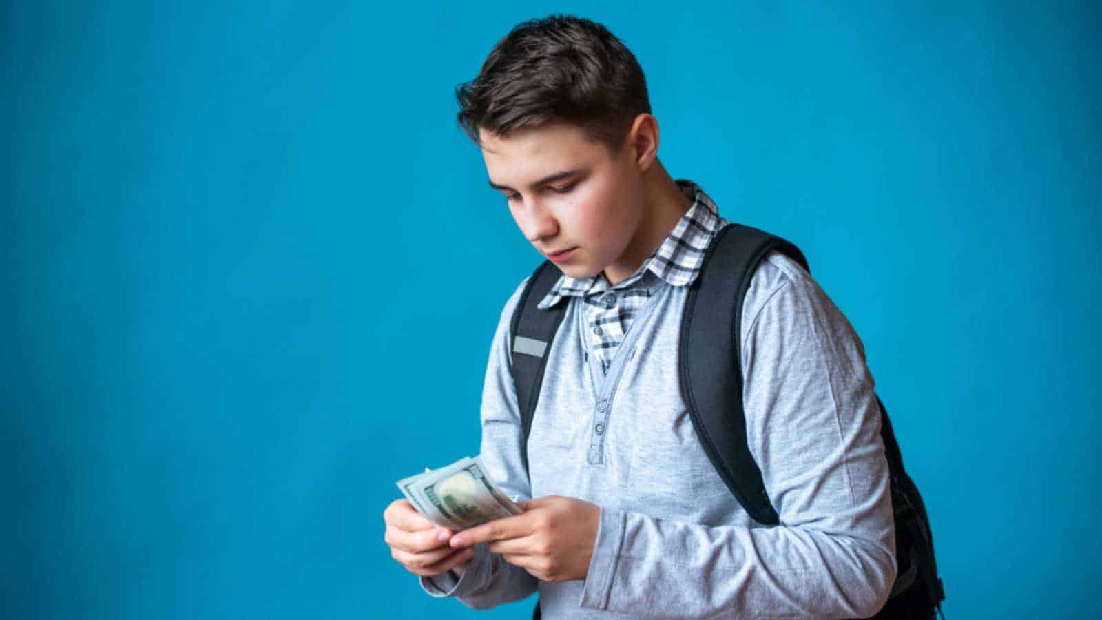 Teen counting money