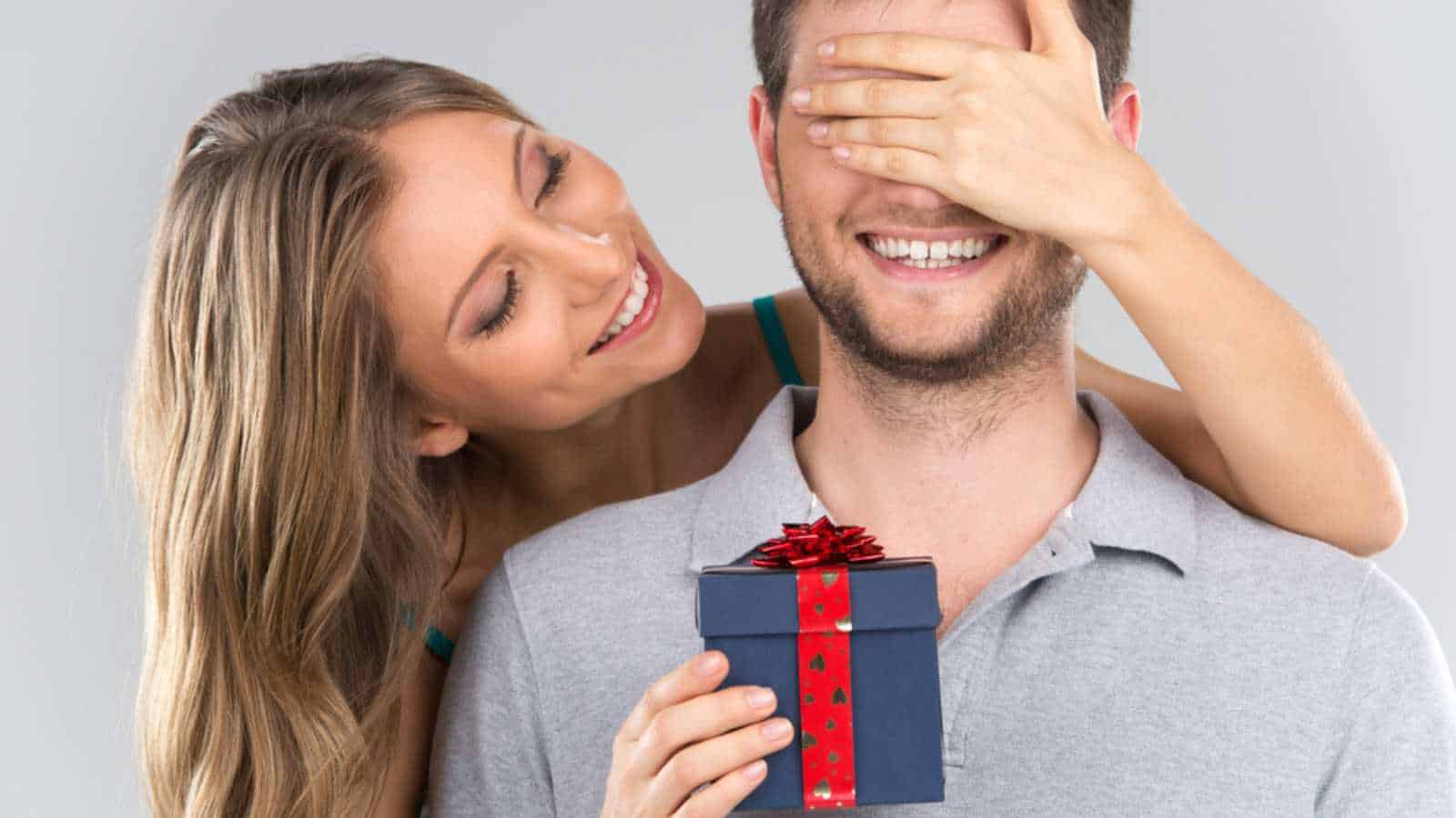 Woman gifting Man