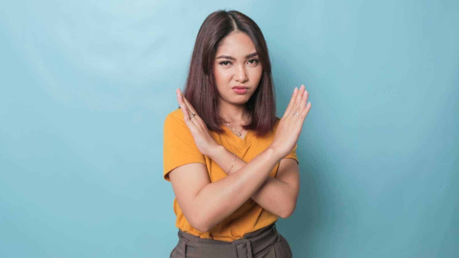 Asian woman refusing