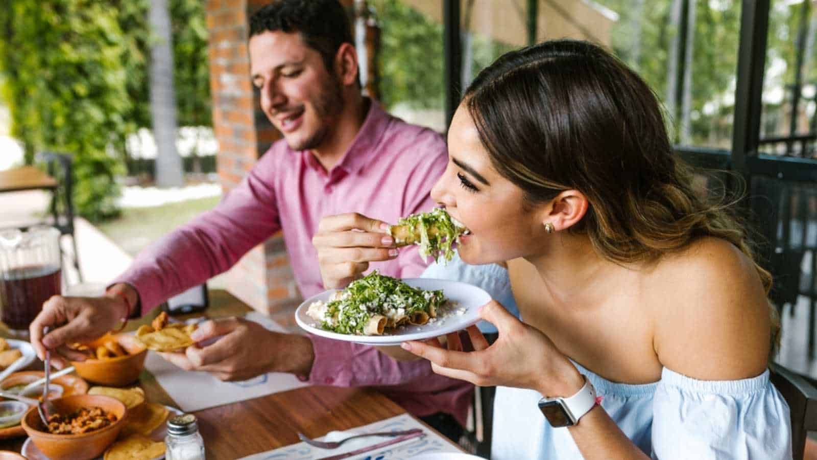 Couples eating in restaurant
