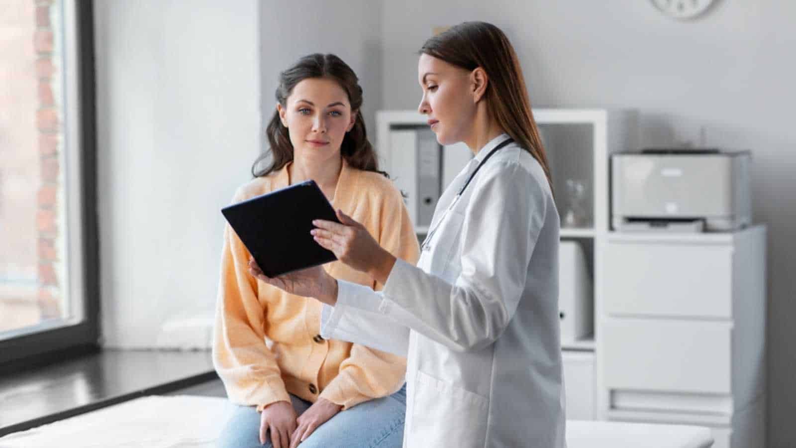 Woman with doctor