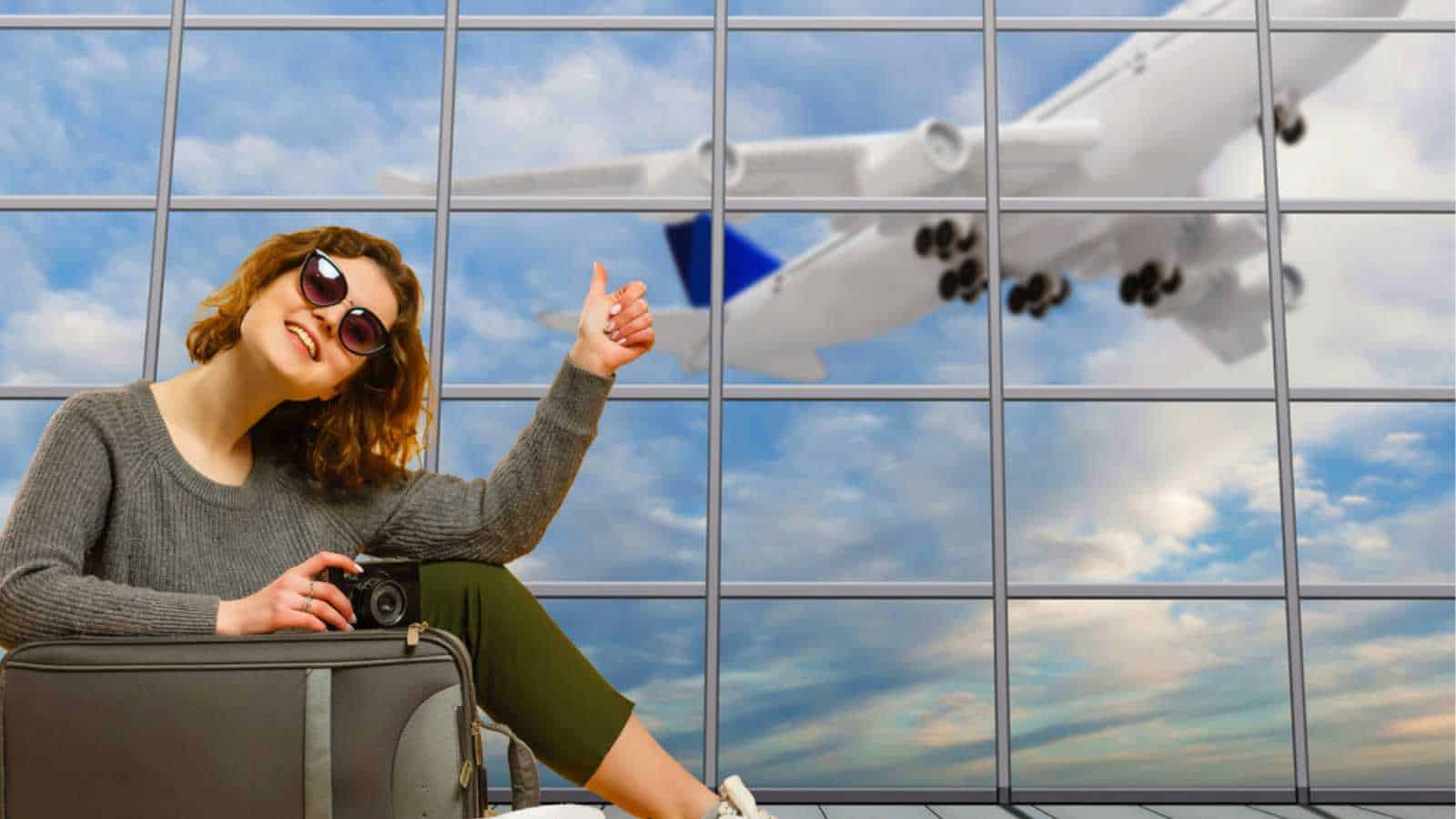 Woman with suitcase in airport
