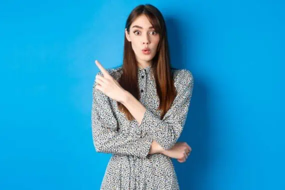 Excited young woman say wow
