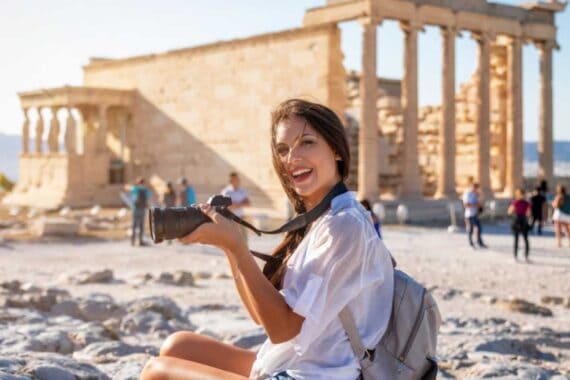 Woman traveler taking photo