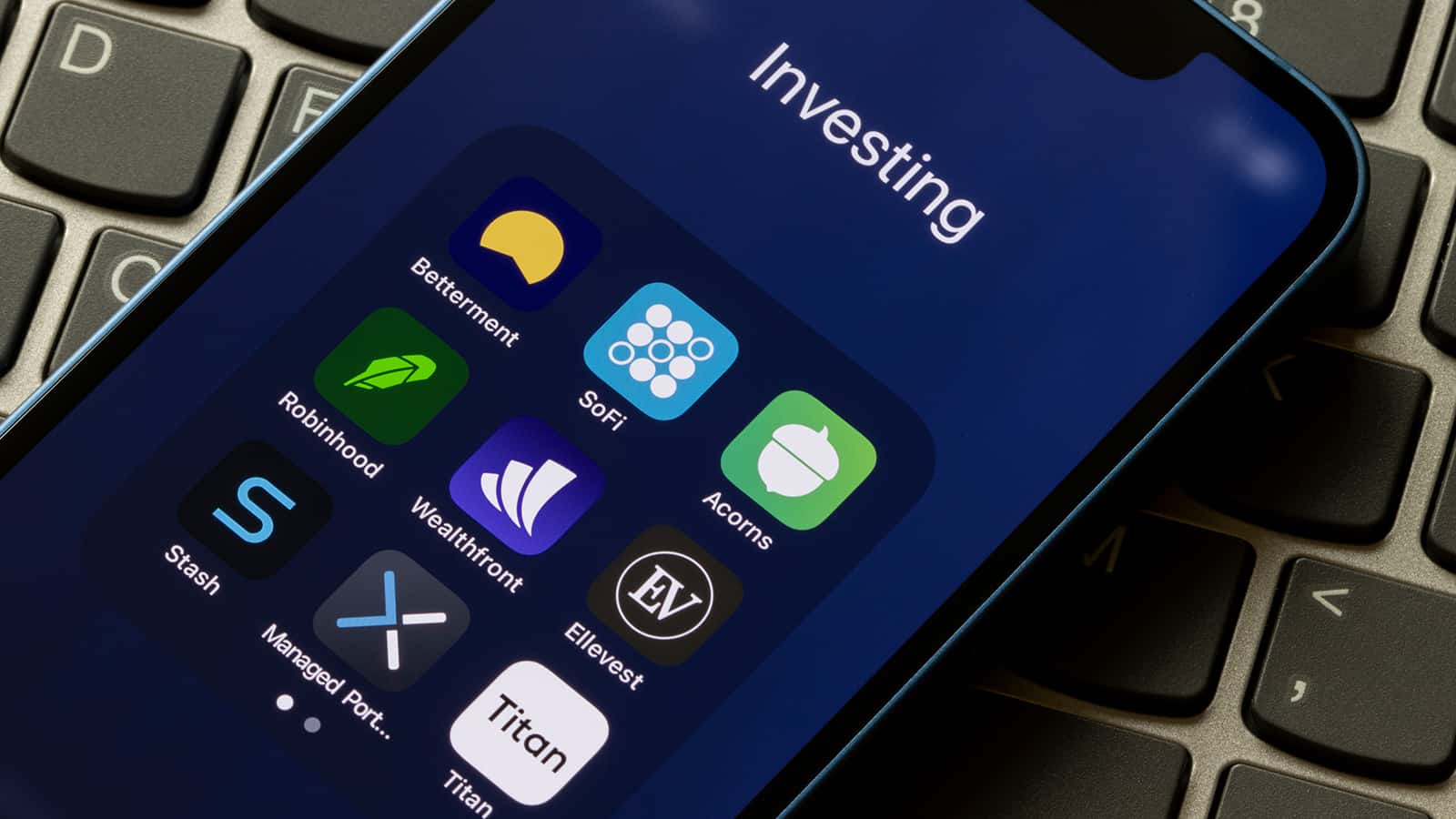 money investing app icons in a phone screen
