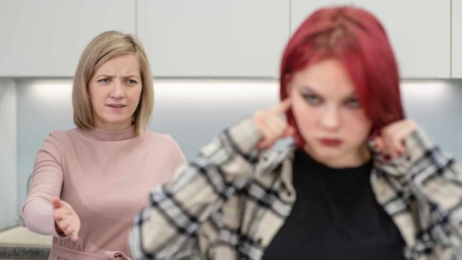 Angry mother scolds her teen daughter