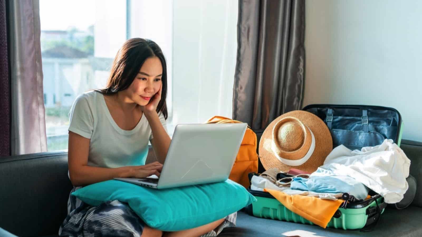 Asian woman traveler planning