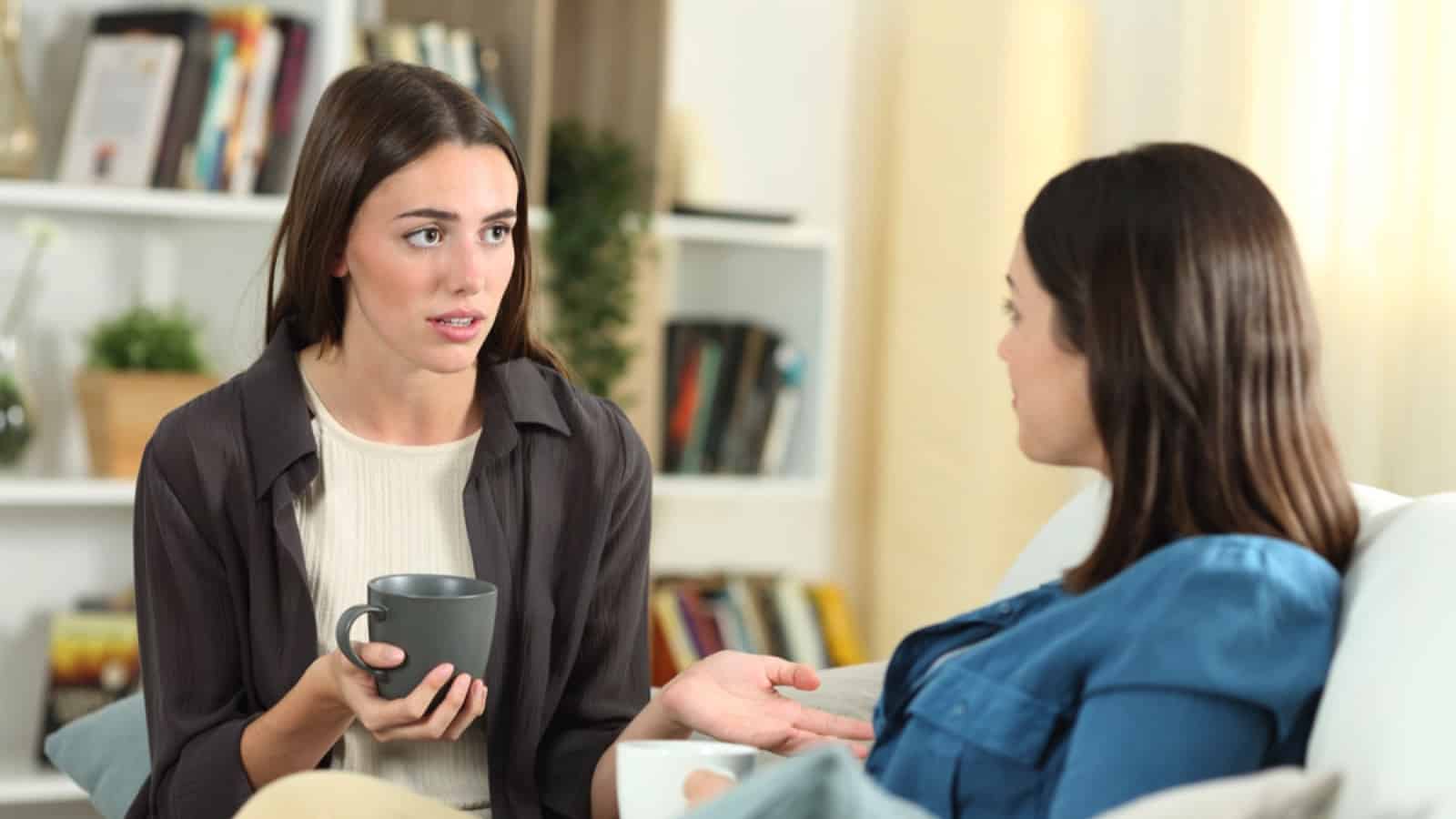 Friends chatting at home