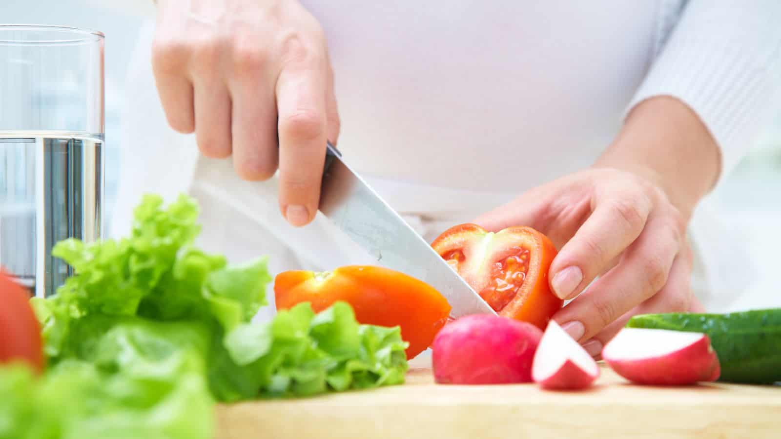 Woman cutting vegetables