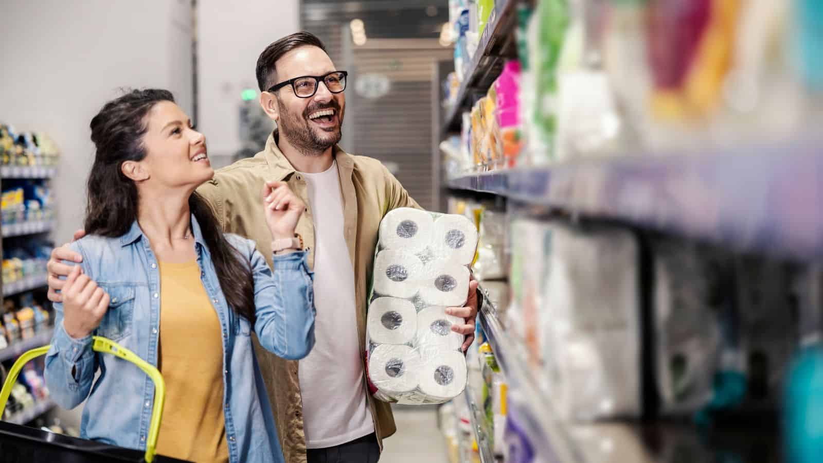 Couple looking at toilet paper
