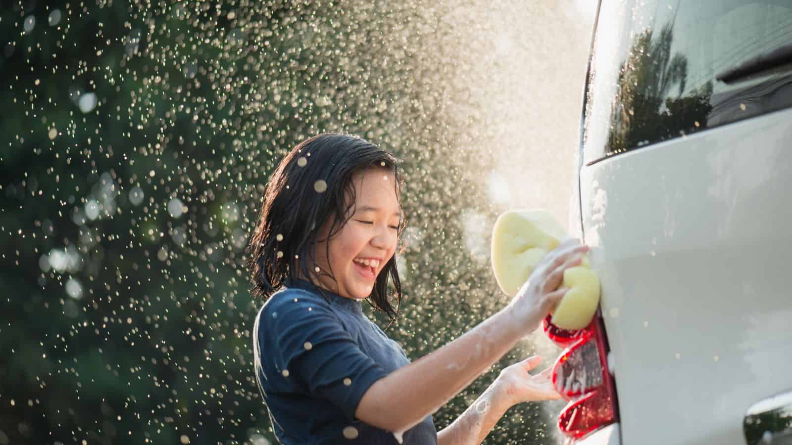 teen washing car